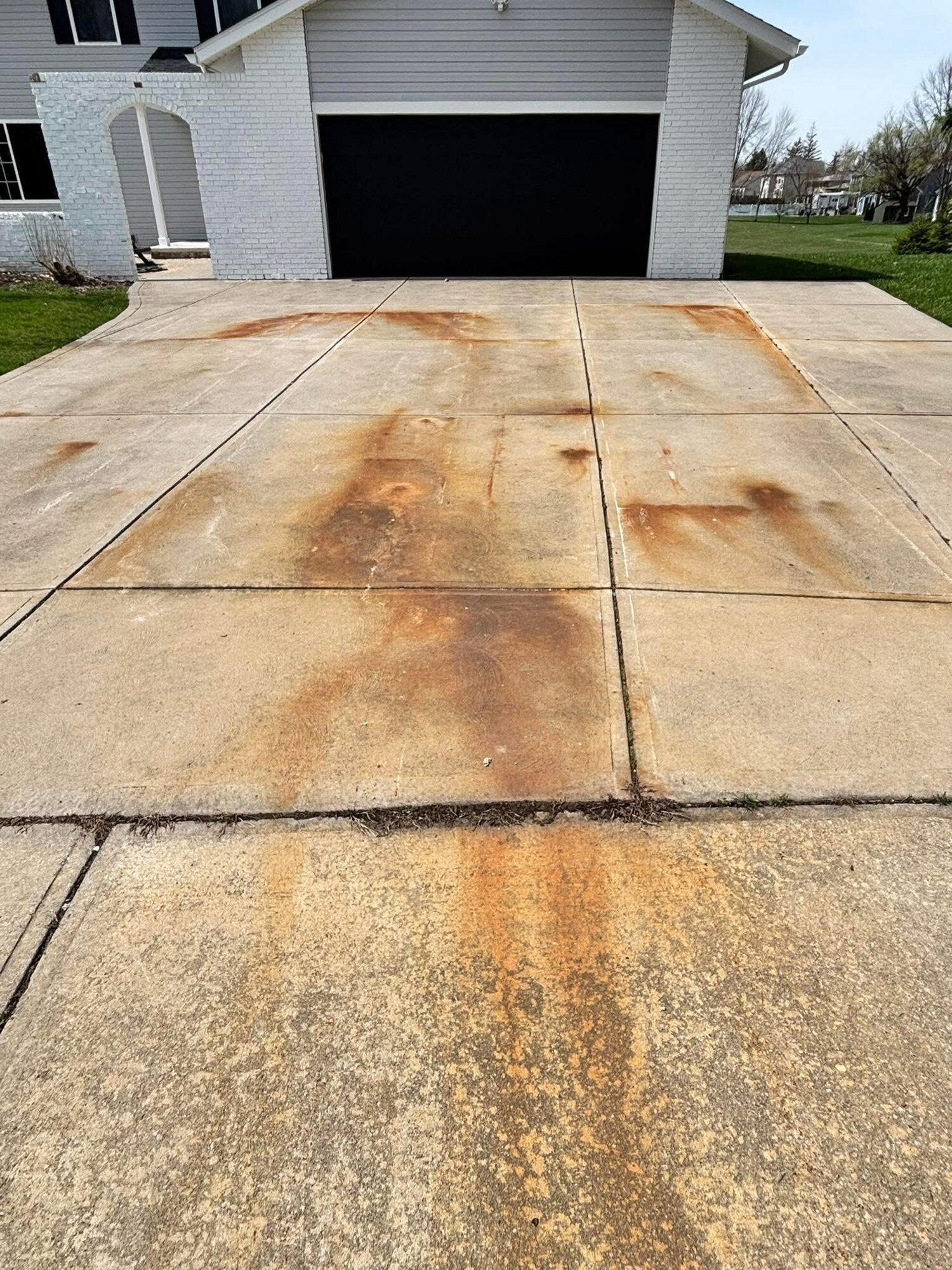 Before: Driveway stain removal