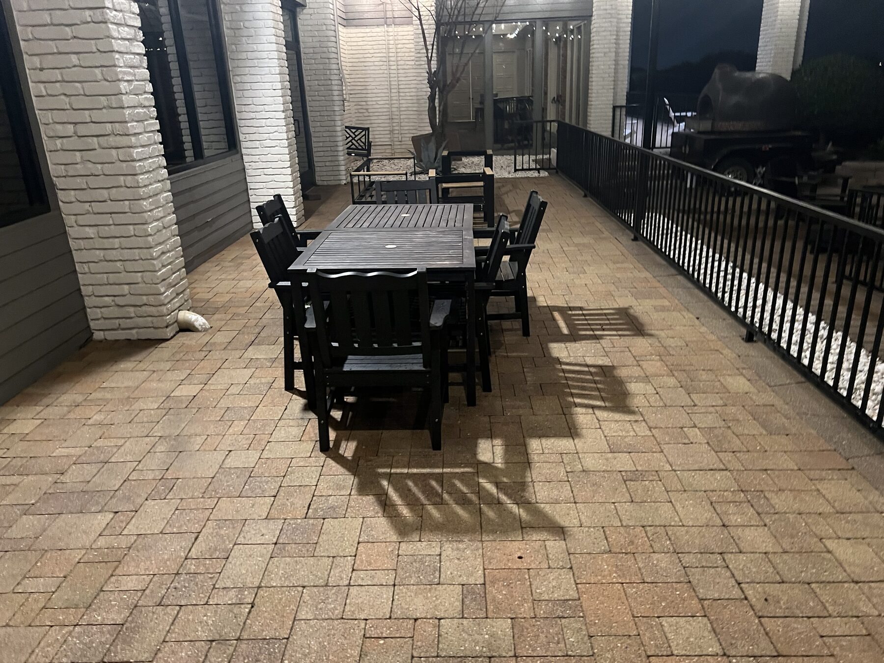 Clean interlocking paver patio after surface work